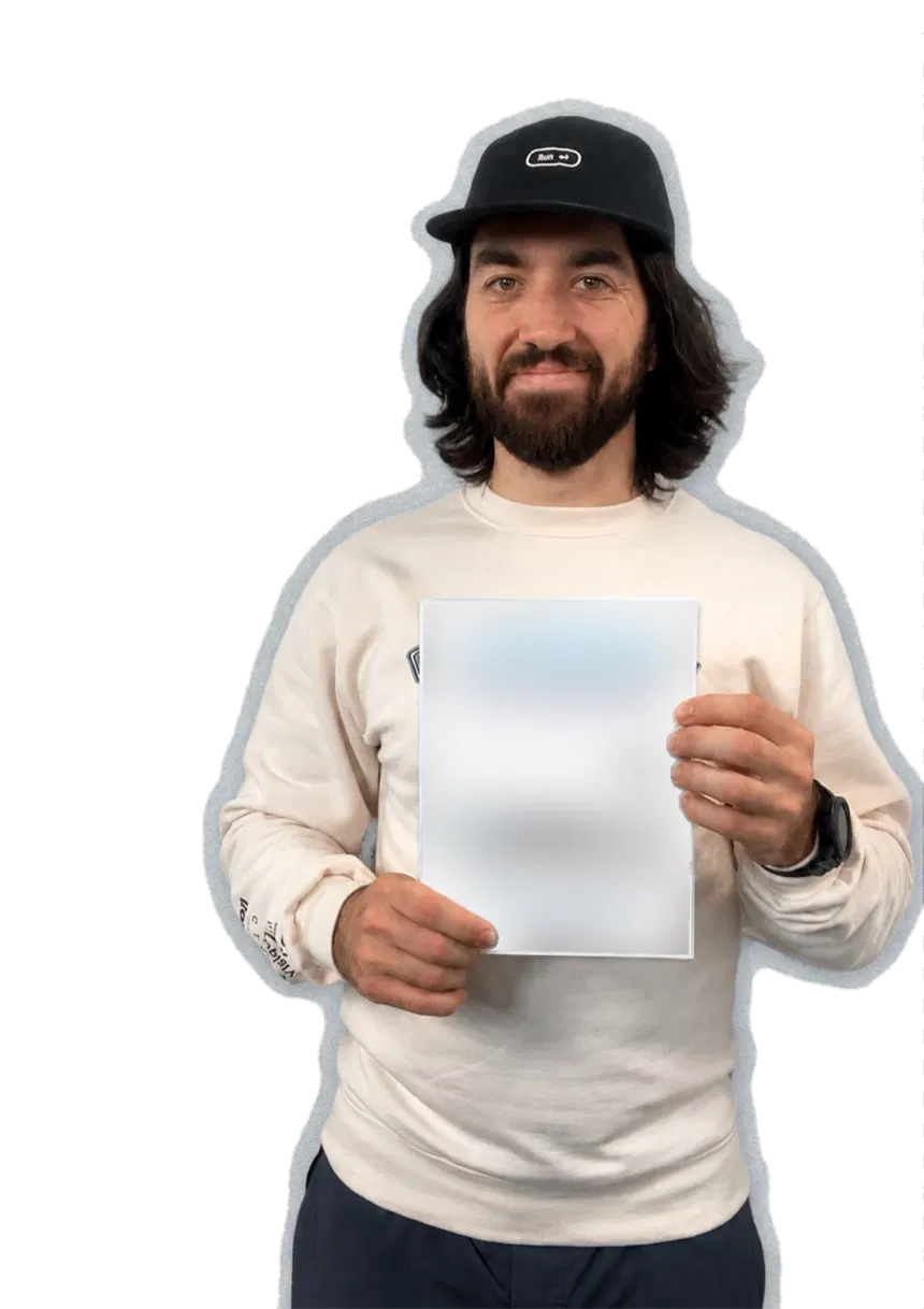 Louis-François Bouchard holding the forthcoming AI Engineering For Production book