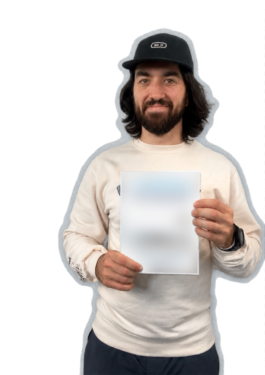 Louis-François Bouchard holding the forthcoming AI Engineering For Production book